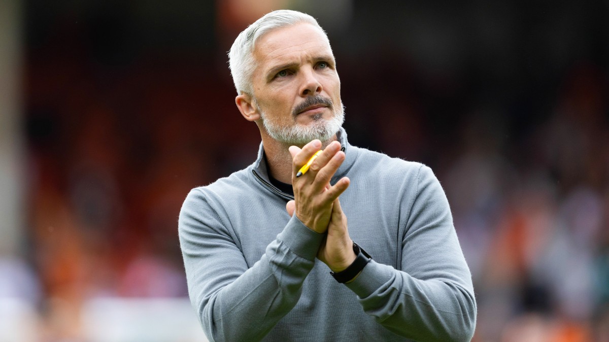 Jim Goodwin applauds the supporters