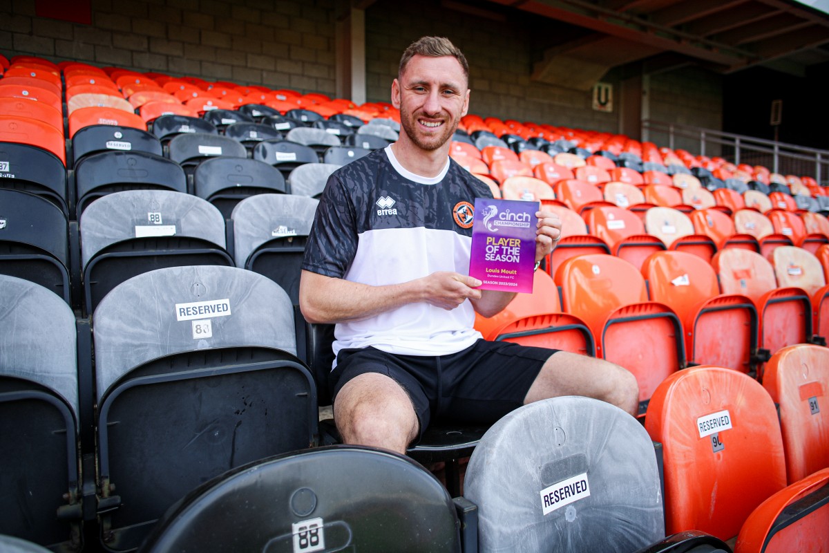 Louis Moult with the award